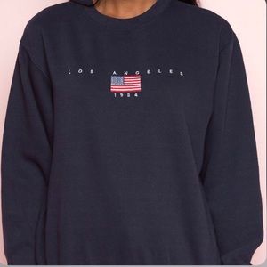 brandy Melville los angeles 1984 crewneck in RED